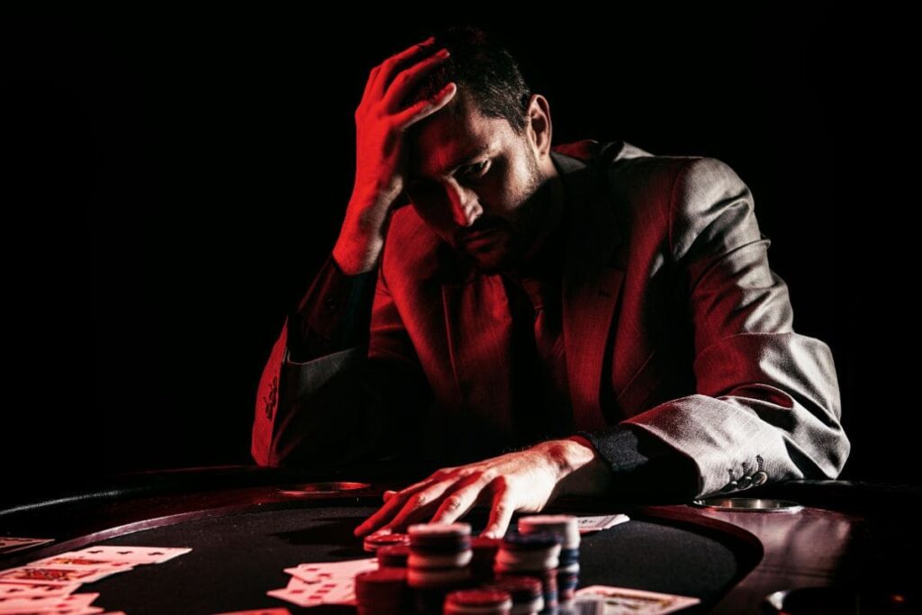 spelmissbrukare i dunkel